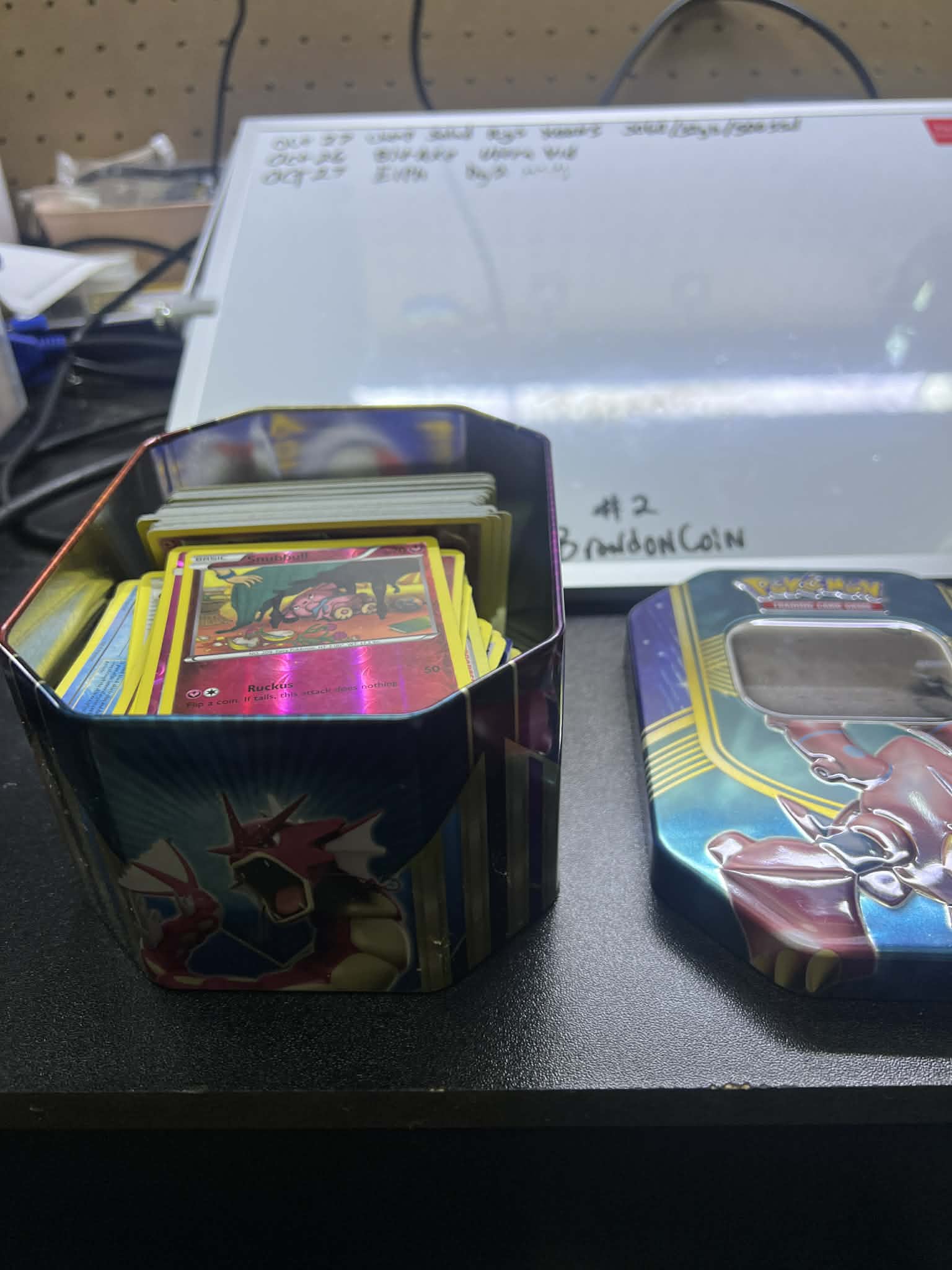 Pokemon Tin full of random cards Blue top